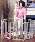 Woman with child beside 3 In 1 Metal Baby Play Yard Enclosure With 8 Panel Playpen Gate Or Extra Wide Fence, living room setup, JPMA Certified.