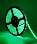 600 LEDs Green Rope Light Strip Waterproof 16.4 Ft Flexible Tape on reel glowing bright green, ideal for various decor uses.