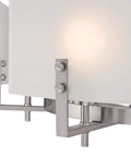 Close-up of Enzo James Brushed Nickel Six Light Indoor Chandelier With Frosted Glass detailing, showing brushed nickel finish