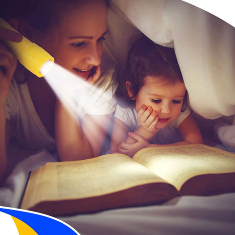 Mother and child reading under blankets using 60 Pack 9 LED Handy Mini Flashlights With Lanyards AAA Batteries Included Bulk Set