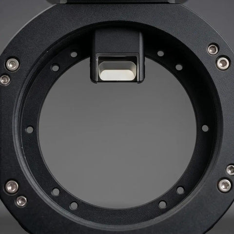 Close-up of Off Axis Guider With Tilt Adjuster OAG Pro showing front view with mounting holes for astrophotography.