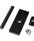 Needle bearing puller kit: four-piece set with a long black bolt, black puller plate with hole, small clamp, and silver nut.