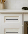 30 Pack 3 Inch Center To Center Solid Matte Black Cabinet Pulls installed on white kitchen drawer