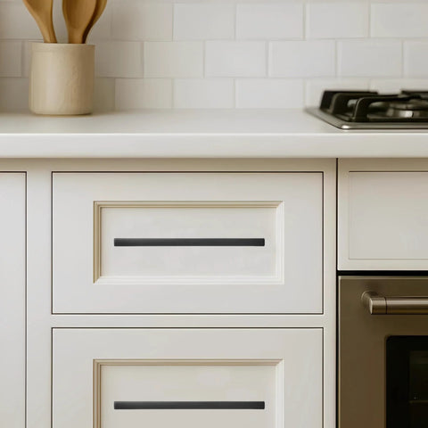 30 Pack 3 Inch Center To Center Solid Matte Black Cabinet Pulls installed on white kitchen drawer