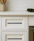 25 Pack 3 Inch Center To Center Matte Black Cabinet Pulls Square Bar Drawer Handles Kitchen Pantry Hardware on white cabinets.