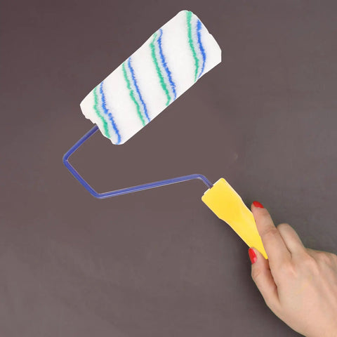 Top Shelf Paint Roller With Removable Sleeve For Smooth As Butter Wall And Ceiling Coat Zero Grind Handle in hand.