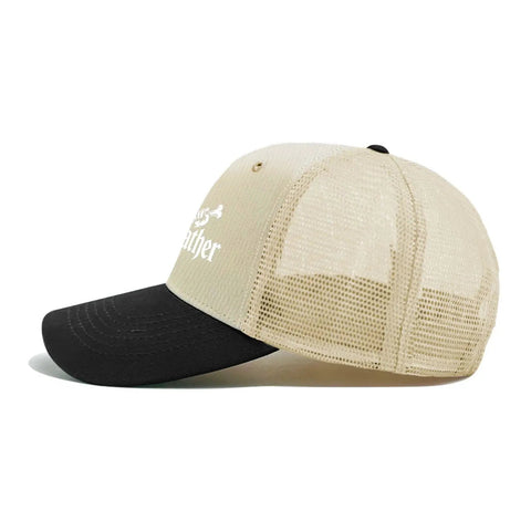 Side view of a washed distressed trucker cap with beige mesh and black bill, ideal for men and women, dope street style.