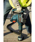 Person using SpeedXtreme SDS Max Rotary Hammer Drill Bit 1 in diameter with 100 percent carbide head and four cutter design