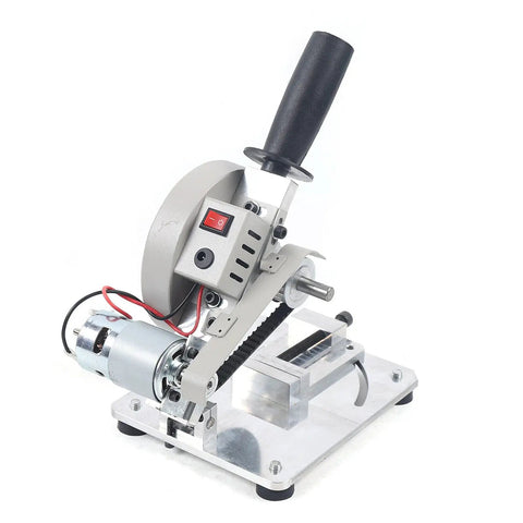 Portable Mini Table Saw Featuring Adjustable Zero To Forty Five Degree Angle Guide Designed For Sharp Wood Metal And Plastic Cuts Delivers Killer Precision And Heavy Duty Build Quality That Will Blow Your Mind On Any Garage Workshop Day, close-up of saw with motor and handle.