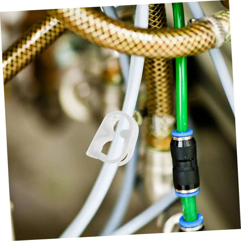 Adjustable Flow Control Tube Clips For 1/4 And 5/16 Inch Hoses shown in use on flexible tubing among wires and hoses