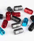 4 Piece Heavy Duty Aluminum Tire Valve Stem Caps For Tesla Cybertruck 2024 To 2026, red and blue anodized caps arrangement
