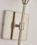 Close-up of Brushed Nickel Wall Sconces Set Of 2 Sleek Modern Industrial Vanity Lights With Clear Glass Shades for Bathroom fixtures