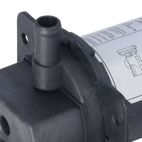 Close-up of the inlet fitting on a Rugged Self Circulating Engine Water Jacket Heater Designed To Beat The Freeze And Deliver Smooth Cold Weather Starts With Zero Hassle Plug And Go Convenience At One Twenty Volts.