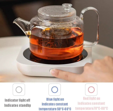 Keep Those Daily Brews Popping With This Touch Control Coffee Mug Warmer And Electric Cup Heater Featuring a tea kettle on a warmer with visible temperature indicators.