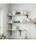 Built Different Steel Shelf Bracket To Handle Serious Weight This Heavy Duty Right Angle Mount supports wooden kitchen shelves with dishes.