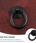 Go To Vintage European Style Zinc Alloy Cabinet Knobs And Mini Drawer Handles Set In Black on wooden surface