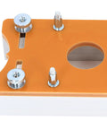 Close-up of Built Tough Aluminum Router Table Insert Plate with orange surface and silver fasteners for garage builders.