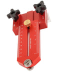 Close-up of Extended Thin Rip Jig for table saws, band saws, and router tables, red anodized aluminum with roller bearing guide.