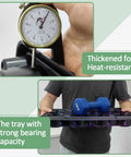 Person holding a black nursery tray testing strong bearing capacity and thickness for heat resistance.