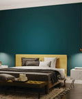 Baland 4 Inch 1 Light Mini Pendant in Brushed Natural Brass with clean slick compact design hanging in a modern bedroom.
