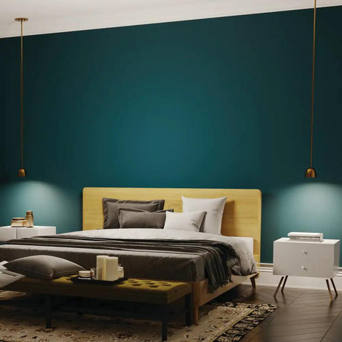 Baland 4 Inch 1 Light Mini Pendant in Brushed Natural Brass with clean slick compact design hanging in a modern bedroom.