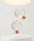 Crystal Glass Cabinet Knobs 10 Pack Diamond Cut Round Drawer Pulls With Rose Gold Base 30mm Clear Knobs displayed artistically