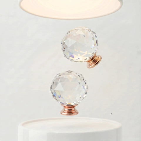 Crystal Glass Cabinet Knobs 10 Pack Diamond Cut Round Drawer Pulls With Rose Gold Base 30mm Clear Knobs displayed artistically