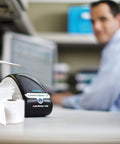 No Sweat Direct Thermal Label Printer With Zero Ink Hassles engineered for fast shipping labels, shown on desk with labels.