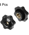 Heavy Lifter Four Pack Star Knobs With M10 Female Thread And 38mm Head Plastic Clamping Handles showing two black star knobs with brass inserts.
