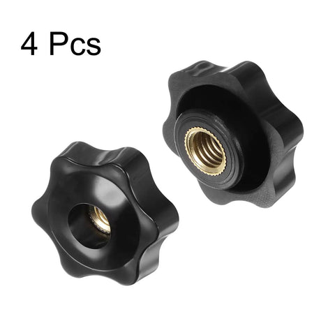 Heavy Lifter Four Pack Star Knobs With M10 Female Thread And 38mm Head Plastic Clamping Handles showing two black star knobs with brass inserts.