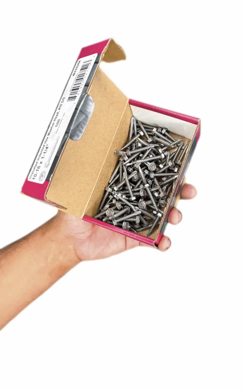 Box of 410 Stainless Steel Unslot Indent Hex Washer Head Screw 14-14X1 Three Point Drive held in hand