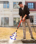 Man using Turbo Rotating Pressure Washer Nozzle With 4000 PSI Max And Quarter Inch Quick Connect for cleaning concrete