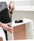 Person installing Rubber Toggle Latches For Storage Boxes And Cabinets, Noise Reducing Draw Catch For Boats, 2 Pack on white cabinet