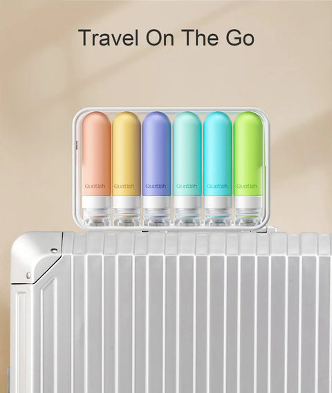 Leakproof Travel Bottles 6 Pack, 3 Oz TSA Approved Refillable Silicone Containers on suitcase