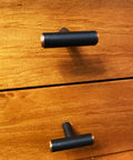 Solid Stainless Steel Euro Style Bar Cabinet Pulls 25 Pack One And Three Quarter Inch Length Oil Rubbed Bronze Finish on wooden drawers