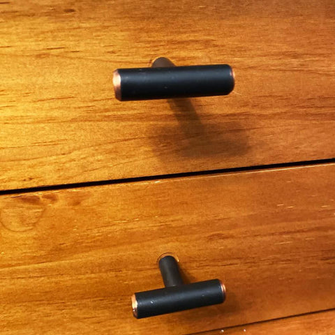 Solid Stainless Steel Euro Style Bar Cabinet Pulls 25 Pack One And Three Quarter Inch Length Oil Rubbed Bronze Finish on wooden drawers