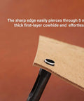 Oval Leather Hole Punch Tool piercing leather, showcasing 2x3mm hole; ideal for belts and watch straps, heavy-duty pro-grade cutter.