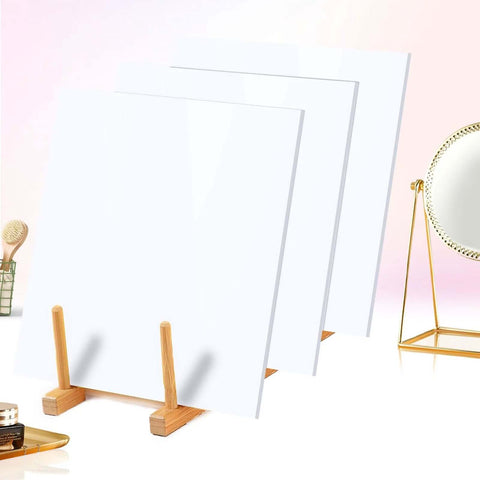 Three white acrylic sheets, 8x8 inches and 3 mm thick, displayed on wooden stands.