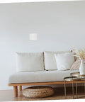 Living room wall with 12 Pack Self-Adhesive Wall Repair Patches For Drywall - Fiberglass Mesh Kit installed for drywall repair.