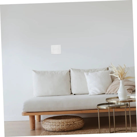 Living room wall with 12 Pack Self-Adhesive Wall Repair Patches For Drywall - Fiberglass Mesh Kit installed for drywall repair.