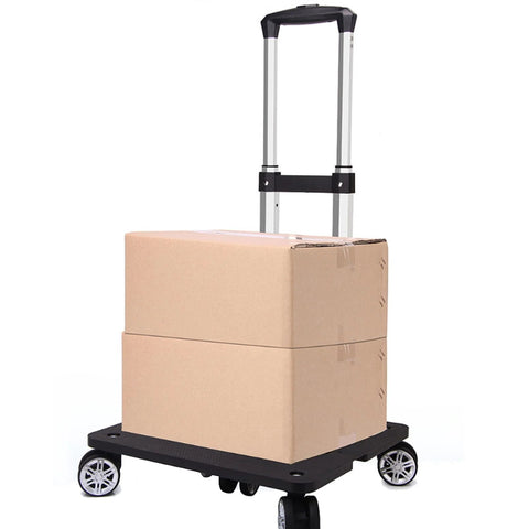 Folding Five Wheel Luggage Cart With Adjustable Height in use carrying two cardboard boxes, showcasing heavy-duty capability and compact design.