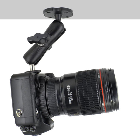 Built Like A Tank Heavy Duty Camera Wall Desk Mount With Dual Ball Heads And Full Rotation Aluminum Alloy Rig For Dslr Cctv and Ram B System With One Quarter Twenty Thread Slick Angle Adjustments angle view of mounted camera.