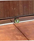 4 Inch V Shaped Bracket Cable Pulley Wheel With Ball Bearings for heavy duty wire rope lifting shown supporting a gate