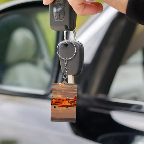 Orange Daylight Aircraft Keychain Set With Personalized Acrylic Keyrings, Chains And Jump Rings in use with car keys.