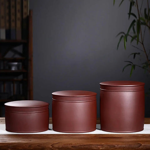 Heavy Hitter Ceramic Rice Jar Round With No Sweat Seal, Retro Large Capacity Airtight Grain Bucket, Real Deal Pantry Storage For Tea Coffee Beans And Snack Stash, High Fire Kiln Made, three jars on a wooden surface.