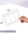Hand holding Screwless Decorator Wall Plates White 3 Pack 3 Gang Switch Cover Plate Electrical Outlet Cover, dimensions shown
