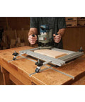 Heavy Duty Variable Router Jig For Cutting Clean Rectangular Recesses And Slots With Rock Solid Anodized Aluminum Frame Plus Quick Adjust Stops in use, cutting wood.