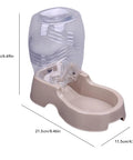 Set It And Forget It Gravity Pet Waterer Keeps Your Pooch Fully Hydrated With Large Capacity Plastic Bowl Featuring Non Slip Base And Whisper Quiet Auto Refill For Dogs And Cats In Beige, measuring 21.5x11.5x17cm.