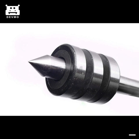 DEVMO MT2 live center for lathe; black steel Morse-taper spindle with knurled grip and pointed tip.