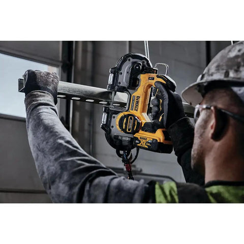 Person using Atomic 20V Max Cordless Brushless Compact Bandsaw Bare Tool Only 1-3/4 Inch Cut Capacity With One-Handed Overhead Cutting